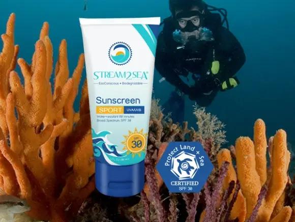 advertising of Reef protective sunscreen with diver in the background