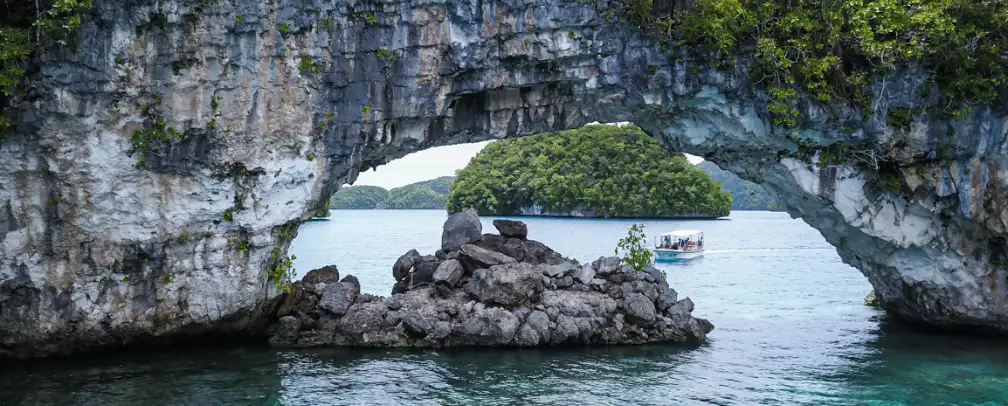 The Arch, a stone formation with a natural arch in Palau's famous Rock islands